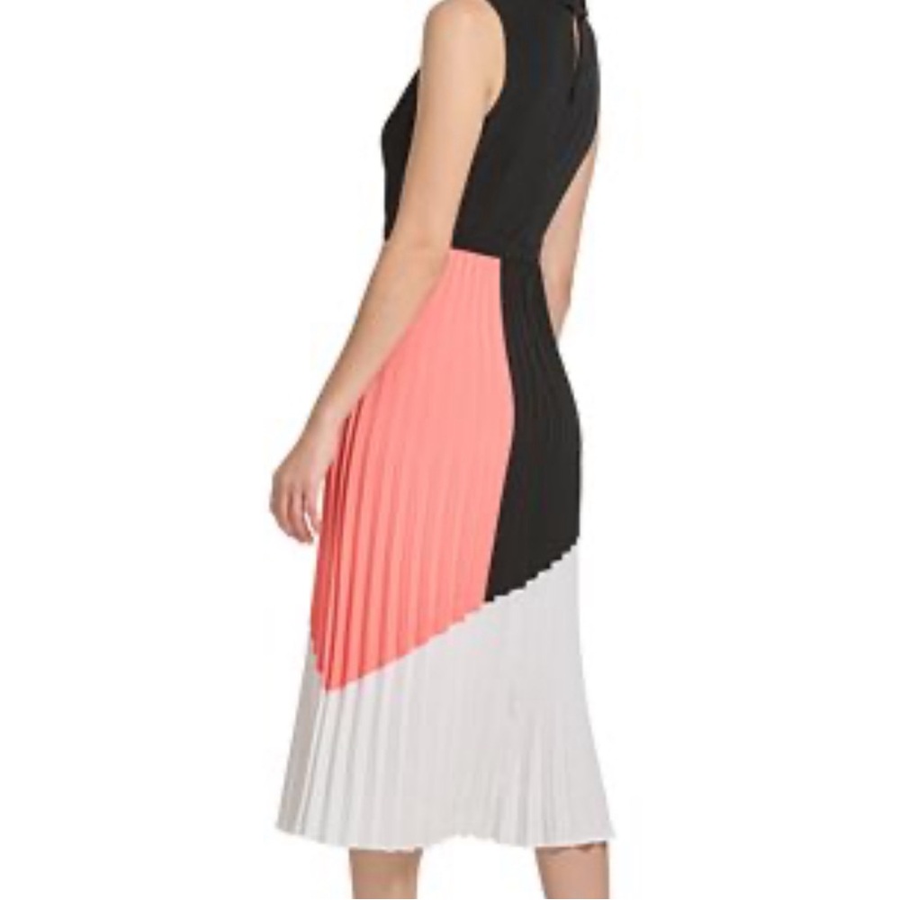 Beautiful dress size 12 mock-neck skirt is not lined but it’s not see through.